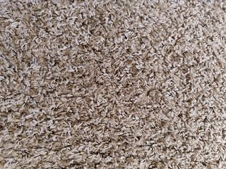 Juego de alfombras marrones