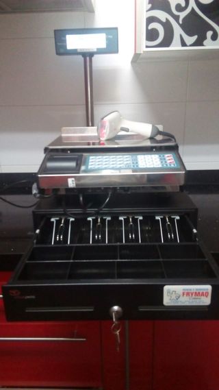 Máquina pesadora registradora