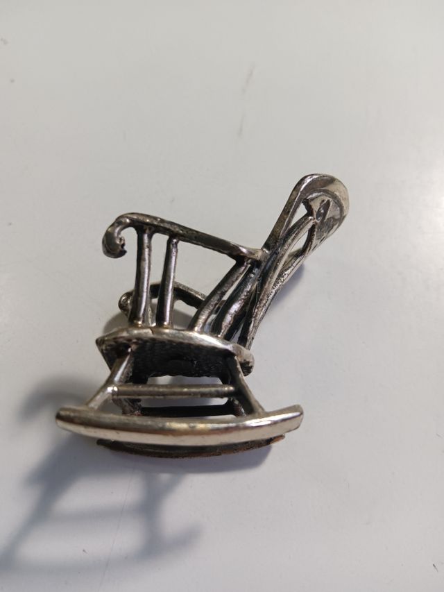 Sedia a dondolo in argento 825