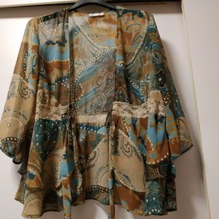 Sobreblusa con volante