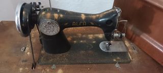Máquina de coser alfa