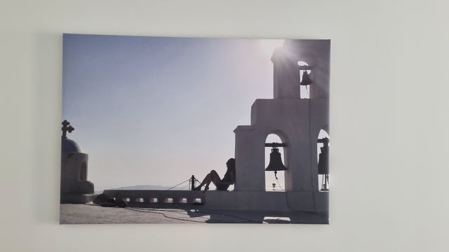 OFERTA Cuadro atardecer chica Santorini 100x70