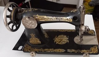 Maquina de coser Singer