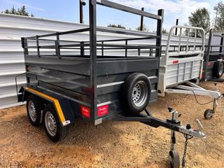 Remolque doble eje 70 mas 30 de lateral.