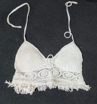 Top sin mangas con flecos