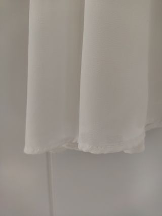 Blusa blanca plisada de Zara