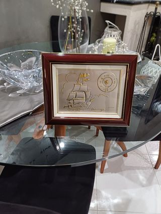 Quadro con placca in argento. 