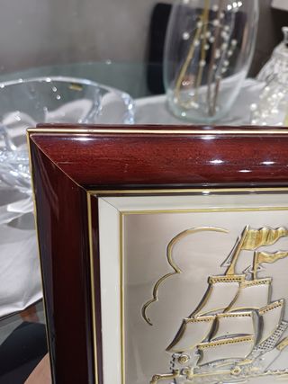 Quadro con placca in argento. 