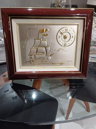 Quadro con placca in argento. 