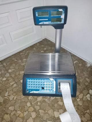 Balanza Baxtran y ticket una caja de 210 unidades