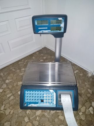 Balanza Baxtran y ticket una caja de 210 unidades