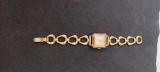 Reloj CAUNY de pulsera funcionando,  chapado oro 