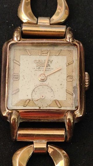 Reloj CAUNY de pulsera funcionando,  chapado oro 