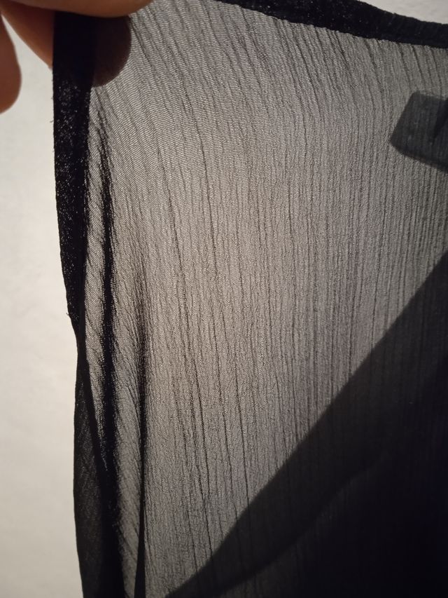 Elegante maglia trasparente sfiancata