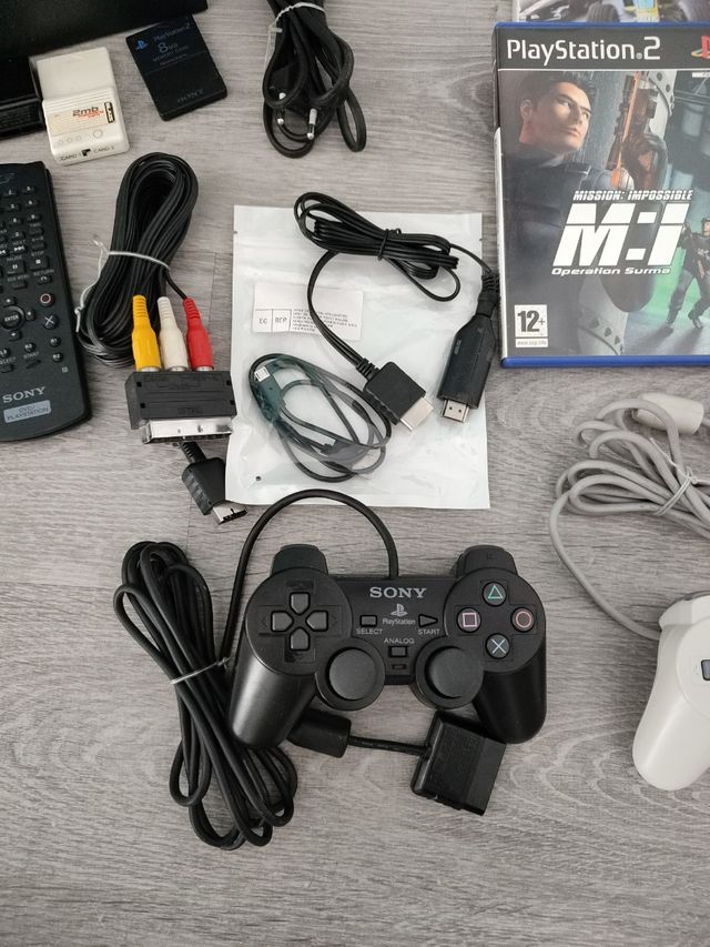 Video consola PS2 + juegos