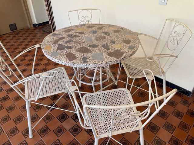 Conjunto de mesa y 4 sillas de exterior vintage