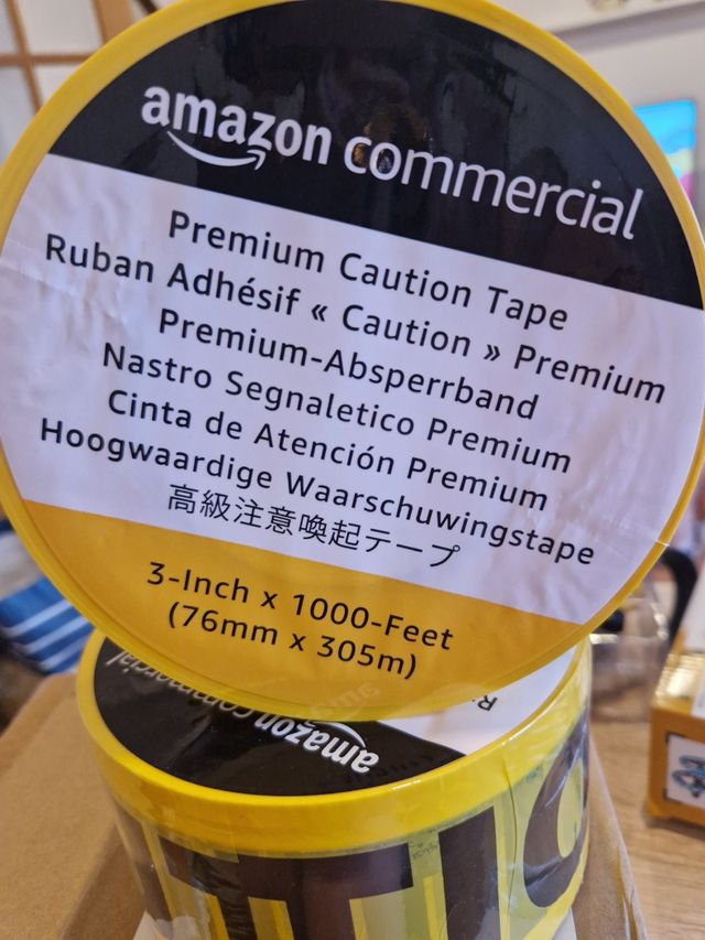 Cinta adhesiva caution