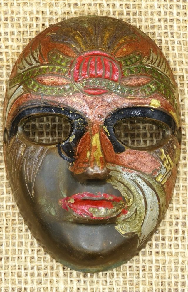 Antigua máscara bronce, vintage