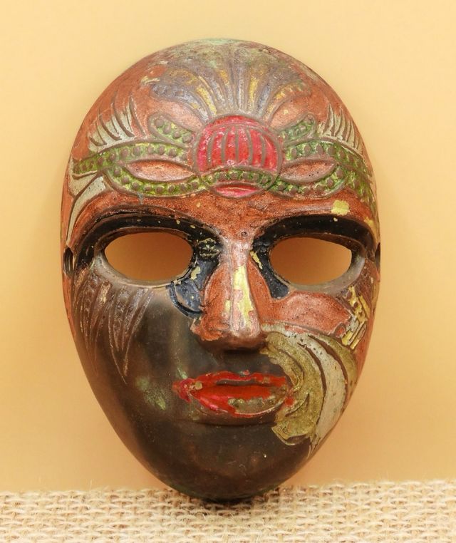 Antigua máscara bronce, vintage