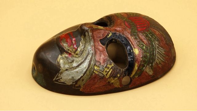 Antigua máscara bronce, vintage