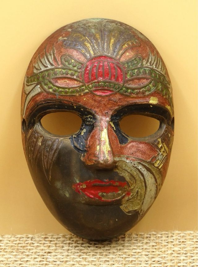 Antigua máscara bronce, vintage