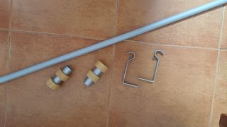 Barra cortina extensible con soportes y terminales