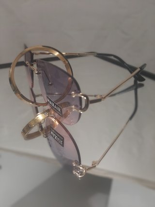 Set de Gafas y pulseras Cartier