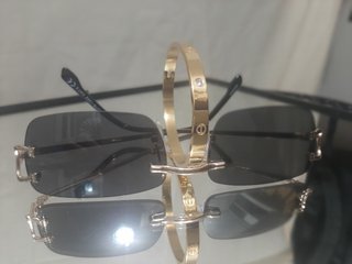 Set de Gafas y pulseras Cartier