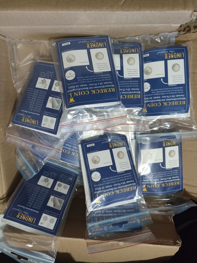 12 confezioni di portamonete