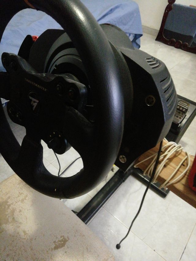 Thrusmaster y asiento playseat 
