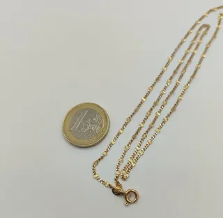 X100 CADENA GROUMET ESTRELLITAS ORO 18K
