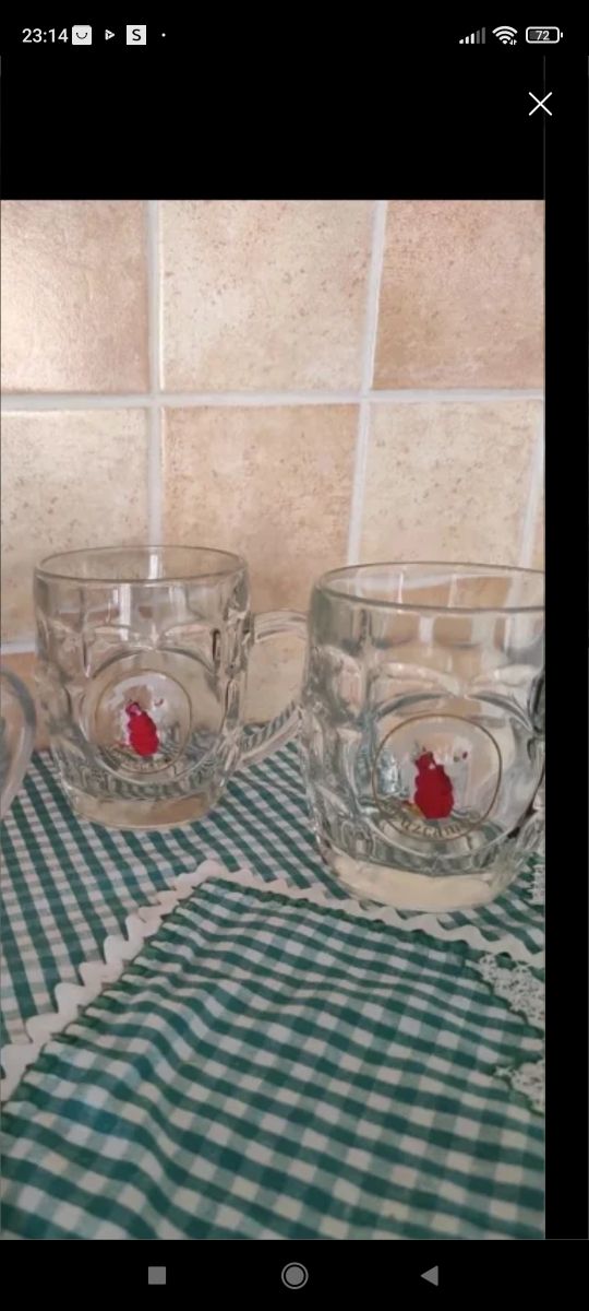 Dos jarras de cerveza Cruzcampo