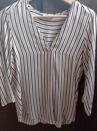 LOTE Dos camisas 8 euros.