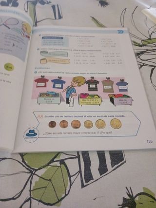 Libro matemáticas y Lengua 3 de primaria.