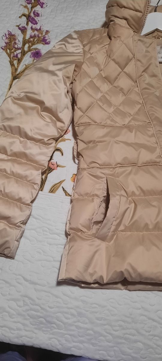 GUESS MUJER PLUMÍFERO