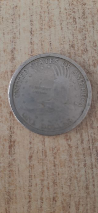 Monedas de dolar y medio