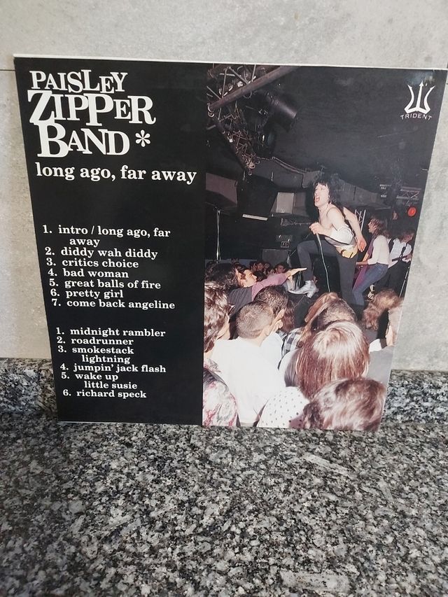 Disco vinilo País ley zipper band