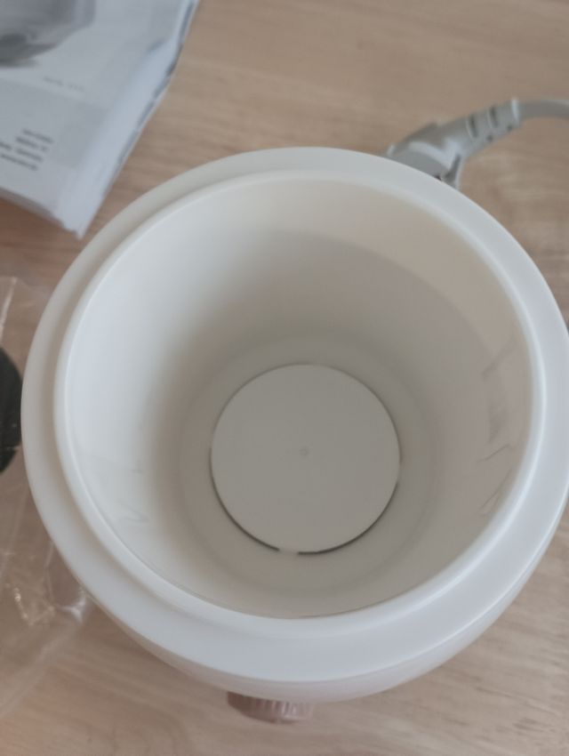 Calienta biberones Reer