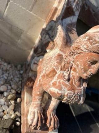 Banco ornamental con esfinges de tres plazas