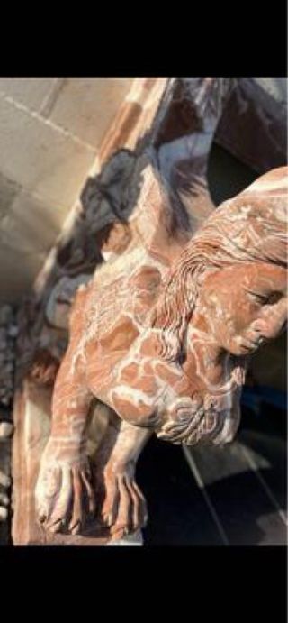 Banco ornamental con esfinges de tres plazas