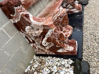 Banco ornamental con esfinges de tres plazas