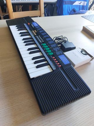 Casio SA-21 y adaptador