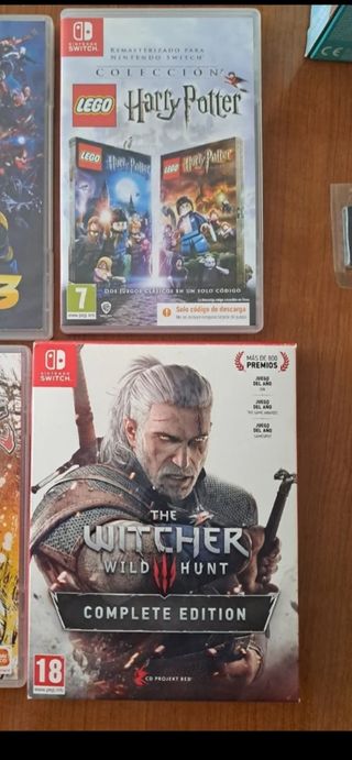 Nintendo switch lite CON FUNDA Y JUEGOS