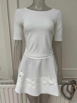 Conjunto falda vuelo red y top espalda cruzada