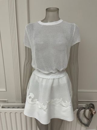 Conjunto falda vuelo red y top espalda cruzada