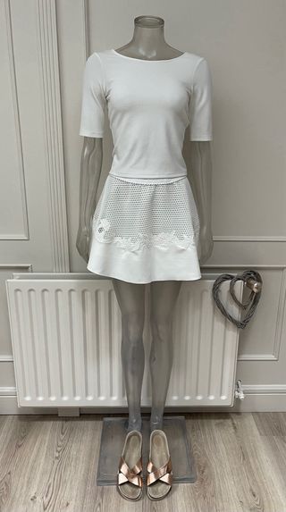 Conjunto falda vuelo red y top espalda cruzada