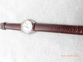 Reloj "Galaxie by Elgin", quartz, 34,8 mm. sin cc.