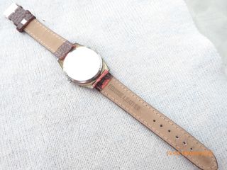 Reloj "Galaxie by Elgin", quartz, 34,8 mm. sin cc.