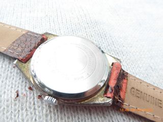 Reloj "Galaxie by Elgin", quartz, 34,8 mm. sin cc.