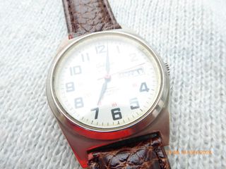 Reloj "Galaxie by Elgin", quartz, 34,8 mm. sin cc.